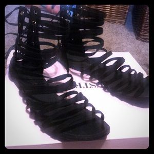 Black gladiator sandals. Worn once.
